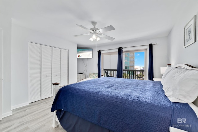 bedroom featuring a closet, ceiling fan, light hardwood / wood-style floors, and access to exterior