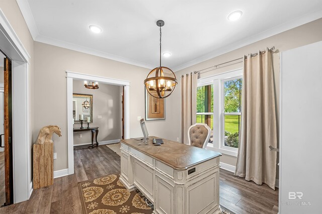 dining area featuring ornamental molding, dark wood-type flooring, and a chandelier