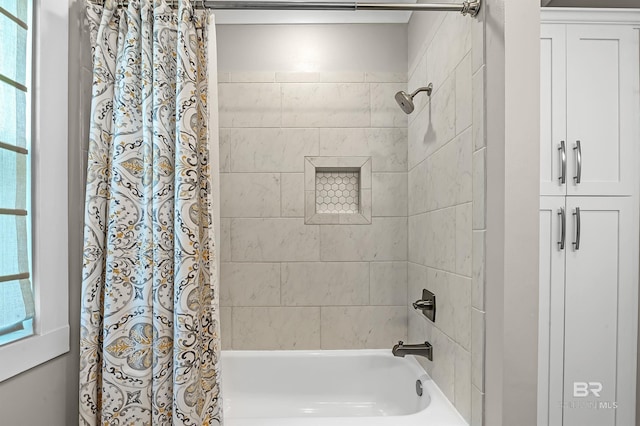 bathroom featuring shower / bath combination with curtain