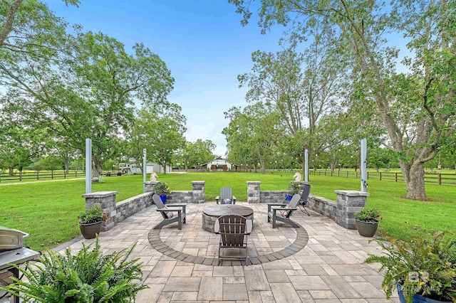 view of patio featuring a fire pit