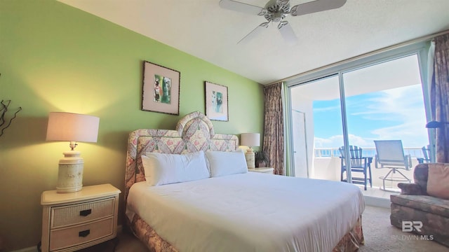 bedroom with carpet, ceiling fan, and access to exterior