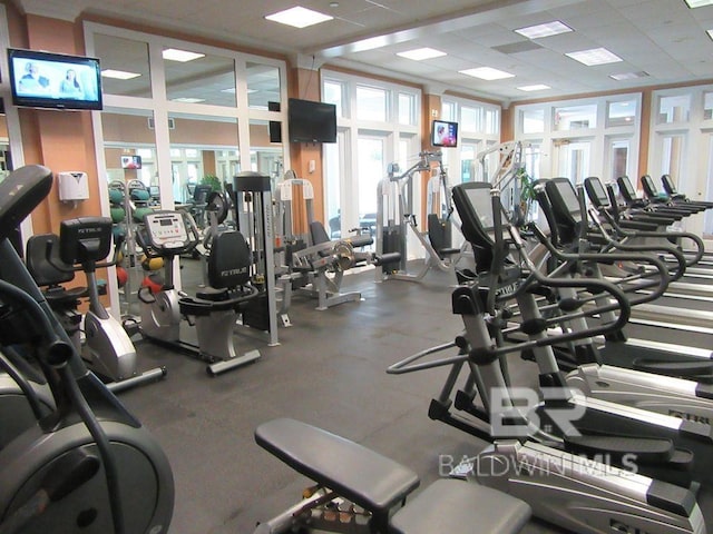 workout area featuring a drop ceiling