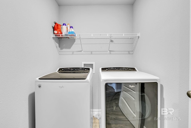 laundry room featuring washer hookup and separate washer and dryer