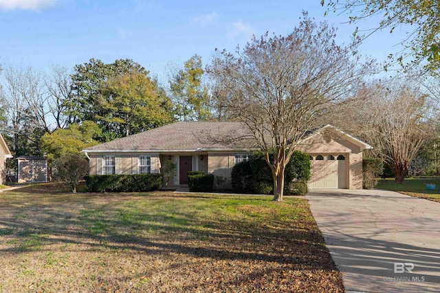 ranch-style home featuring a front lawn and a garage