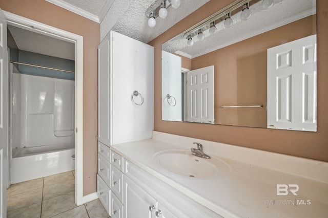 full bathroom with vanity, tile patterned floors, tub / shower combination, toilet, and a textured ceiling