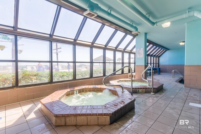 view of swimming pool featuring an indoor in ground hot tub