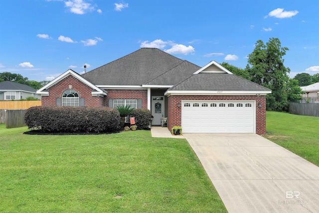 25697 Overlook Dr, Loxley, AL 36551 - view of front of home with a garage, concrete driveway, brick siding, and roof with shingles