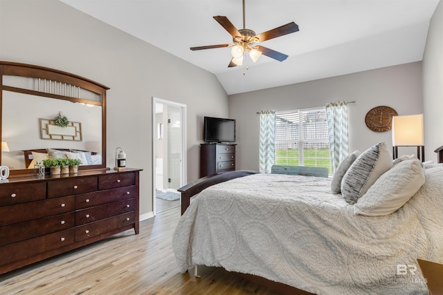 25697 Overlook Dr, Loxley, AL 36551 - bedroom featuring lofted ceiling, wood finished floors, a ceiling fan, baseboards, and ensuite bathroom