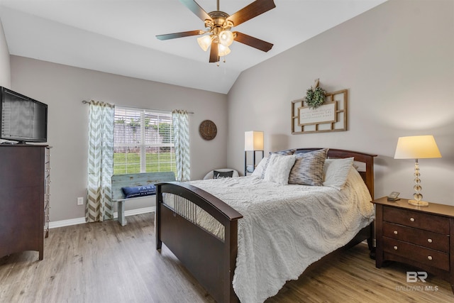 25697 Overlook Dr, Loxley, AL 36551 - bedroom with wood finished floors, lofted ceiling, baseboards, and ceiling fan
