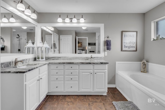 25697 Overlook Dr, Loxley, AL 36551 - bathroom with double vanity, a shower with door, and a garden tub