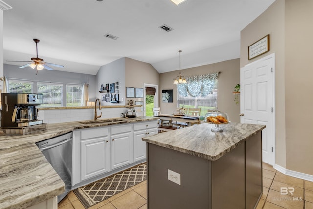 25697 Overlook Dr, Loxley, AL 36551 - kitchen with a sink, dishwasher, vaulted ceiling, a center island, and a chandelier