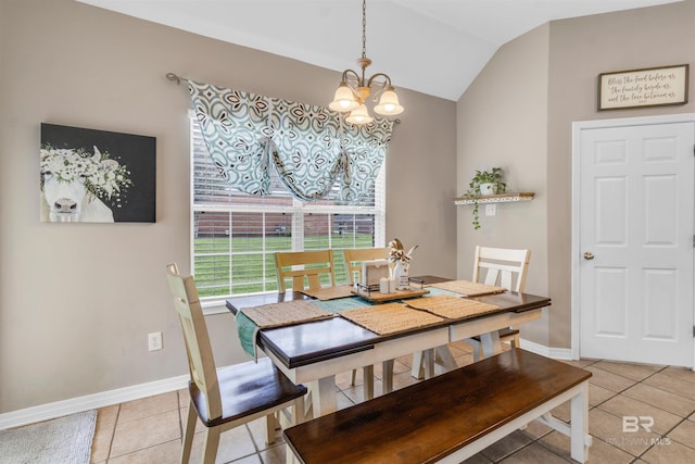 25697 Overlook Dr, Loxley, AL 36551 - dining area with a chandelier, light tile patterned floors, lofted ceiling, and baseboards