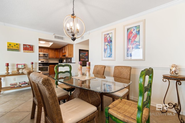 dining room featuring light tile patterned floors, visible vents, a notable chandelier, and ornamental molding