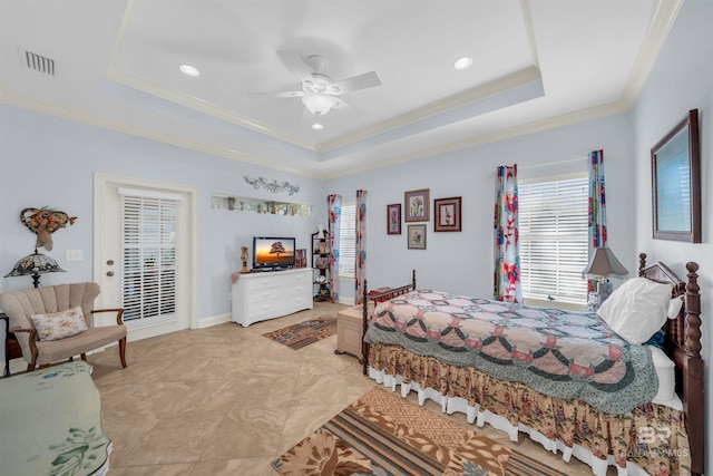 bedroom with a raised ceiling, ceiling fan, and crown molding