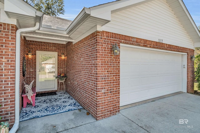 property entrance with a garage