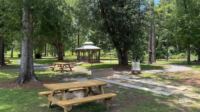 view of community with a gazebo and a yard