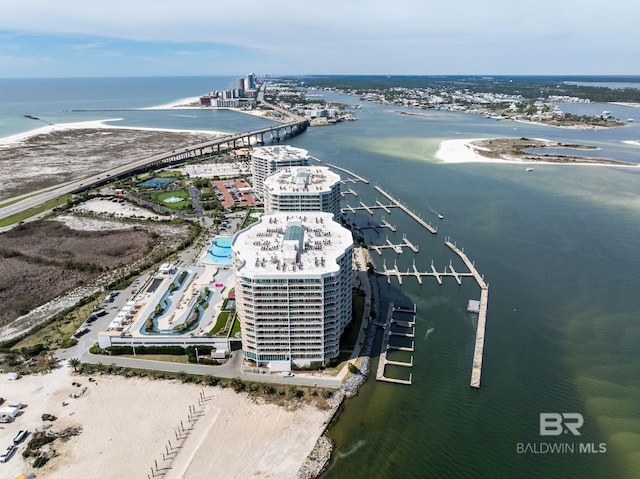 bird's eye view featuring a beach view and a water view