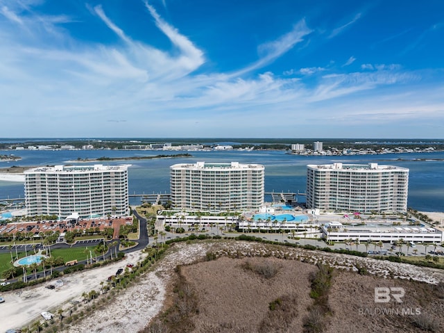 drone / aerial view with a view of city and a water view