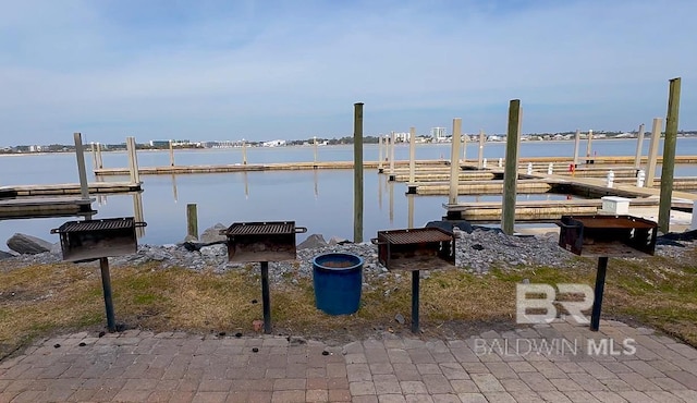 dock area featuring a water view