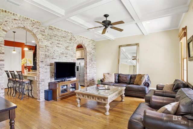 375 S Section St, Fairhope, AL 36532 - living room with beamed ceiling, light wood-style floors, visible vents, and a ceiling fan