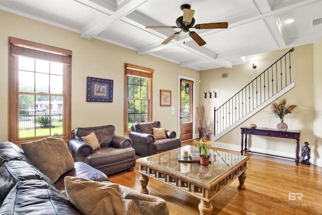 375 S Section St, Fairhope, AL 36532 - living area with coffered ceiling, a ceiling fan, beam ceiling, light wood-style flooring, and stairs