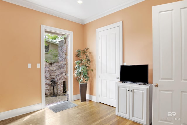 375 S Section St, Fairhope, AL 36532 - interior space featuring crown molding, light wood finished floors, baseboards, and recessed lighting