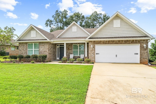 craftsman house with a front yard and a garage