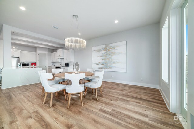 3238 Sea Horse Cir, Gulf Shores, AL 36542 - dining space with recessed lighting, baseboards, a notable chandelier, and light wood-type flooring