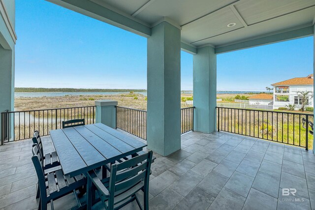 3238 Sea Horse Cir, Gulf Shores, AL 36542 - balcony featuring a water view and a patio area