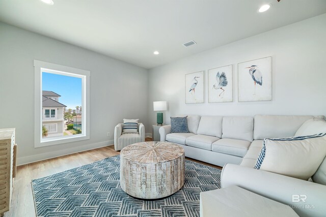 3238 Sea Horse Cir, Gulf Shores, AL 36542 - living room with baseboards, recessed lighting, light wood-style flooring, and visible vents