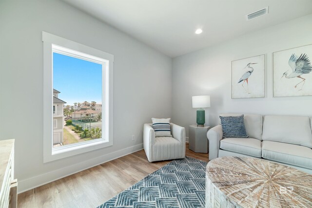 3238 Sea Horse Cir, Gulf Shores, AL 36542 - living area with visible vents, recessed lighting, baseboards, and wood finished floors