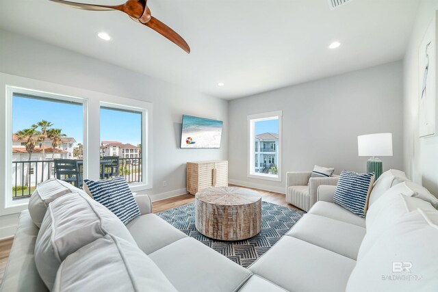3238 Sea Horse Cir, Gulf Shores, AL 36542 - living room featuring baseboards, recessed lighting, ceiling fan, and wood finished floors