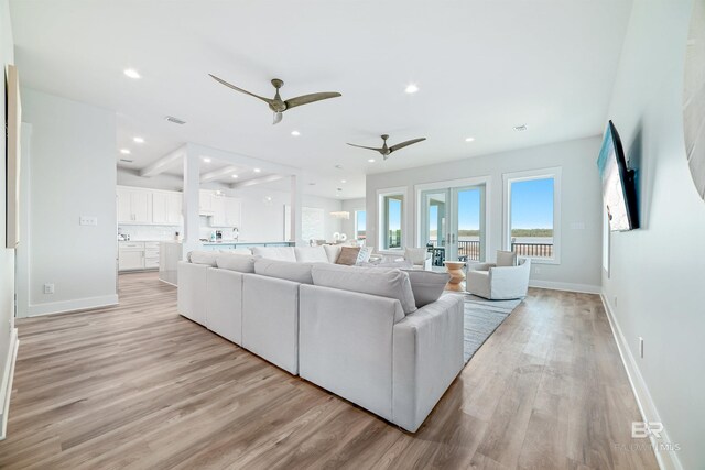 3238 Sea Horse Cir, Gulf Shores, AL 36542 - living room with baseboards, ceiling fan, recessed lighting, and light wood-style flooring