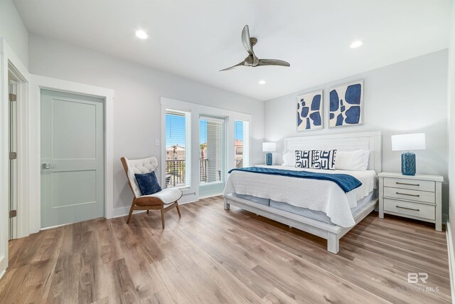 3238 Sea Horse Cir, Gulf Shores, AL 36542 - bedroom featuring a ceiling fan, recessed lighting, light wood-style flooring, and access to exterior