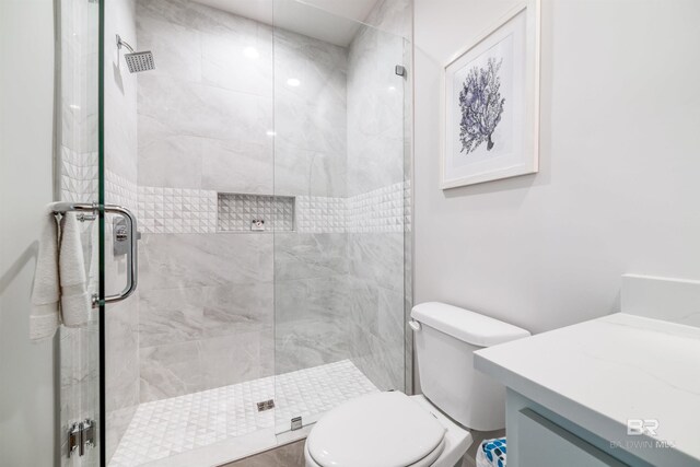 3238 Sea Horse Cir, Gulf Shores, AL 36542 - bathroom featuring vanity, toilet, and a shower stall
