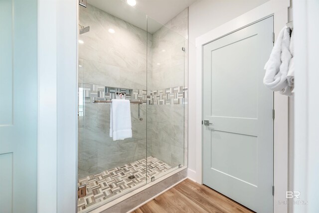 3238 Sea Horse Cir, Gulf Shores, AL 36542 - full bath featuring a stall shower and wood finished floors