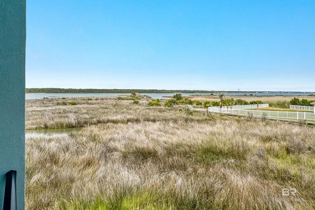 3238 Sea Horse Cir, Gulf Shores, AL 36542 - view of yard with a water view and fence