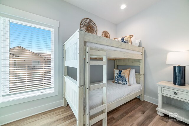 3238 Sea Horse Cir, Gulf Shores, AL 36542 - bedroom featuring baseboards, recessed lighting, and wood finished floors