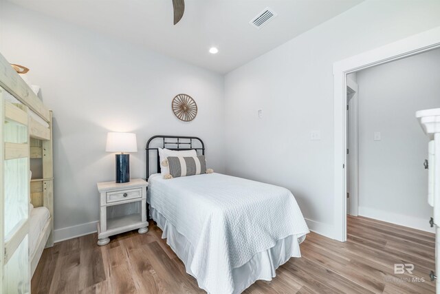 3238 Sea Horse Cir, Gulf Shores, AL 36542 - bedroom featuring recessed lighting, baseboards, visible vents, and wood finished floors