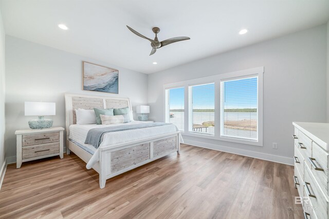 3238 Sea Horse Cir, Gulf Shores, AL 36542 - bedroom featuring light wood-style floors, recessed lighting, baseboards, and ceiling fan