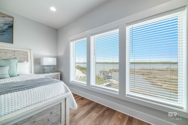 3238 Sea Horse Cir, Gulf Shores, AL 36542 - bedroom featuring baseboards, recessed lighting, and wood finished floors