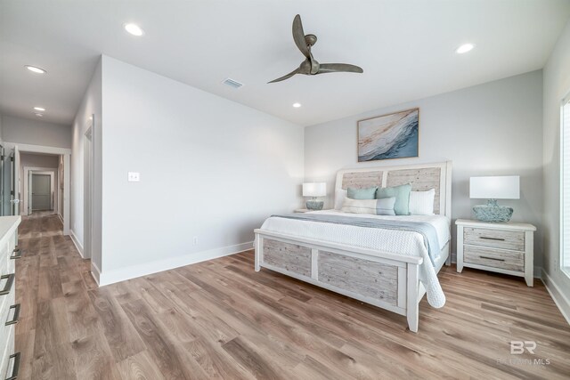 3238 Sea Horse Cir, Gulf Shores, AL 36542 - bedroom with recessed lighting, baseboards, visible vents, and light wood-style floors