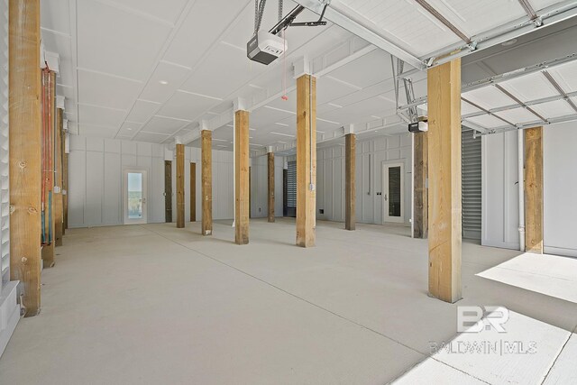 3238 Sea Horse Cir, Gulf Shores, AL 36542 - interior space featuring a garage and concrete flooring