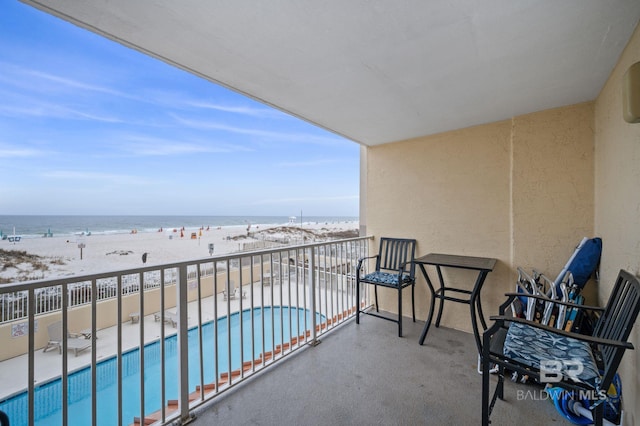 517 E Beach Blvd Unit 1B, Gulf Shores, AL 36542 - balcony with view of pool area and view of water and beach