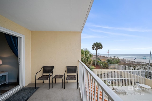 517 E Beach Blvd Unit 1B, Gulf Shores, AL 36542 - balcony featuring a water view