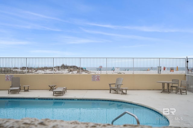 517 E Beach Blvd Unit 1B, Gulf Shores, AL 36542 - community pool with a patio