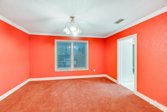 carpeted spare room with crown molding, a textured ceiling, and a notable chandelier