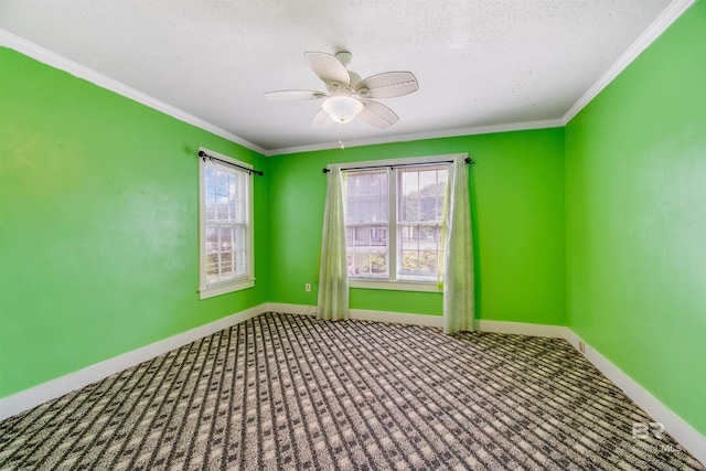 spare room featuring ceiling fan, crown molding, a textured ceiling, and carpet floors