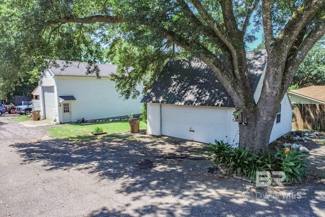 view of home's exterior with a garage