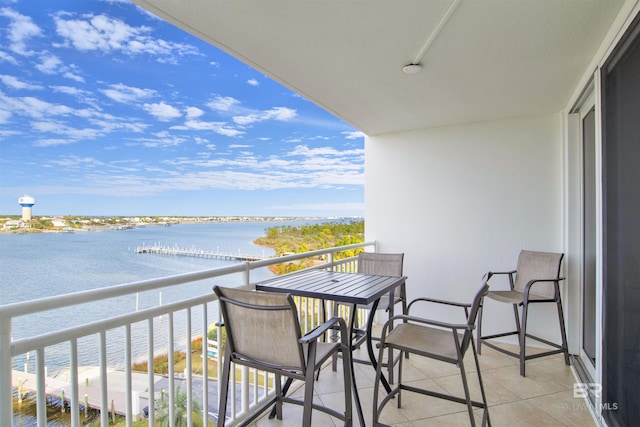 balcony featuring a water view